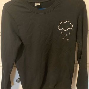 Black crew neck pull over with white cloud.